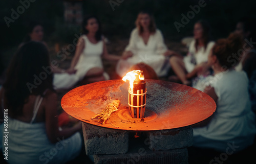 Women at the night ceremony. Ceremony space.