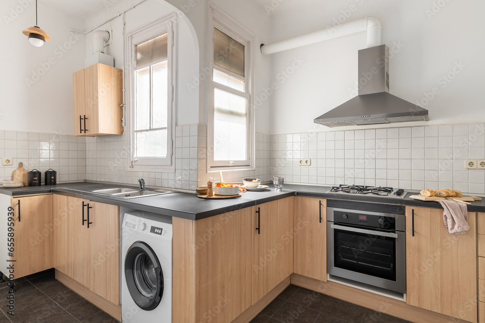 custom made wallpaper toronto digitalStylish kitchen with built-in appliances oven and washing machine with extractor hood and white tiles in a modern apartment. Concept of a five-star hotel and spacious kitchen