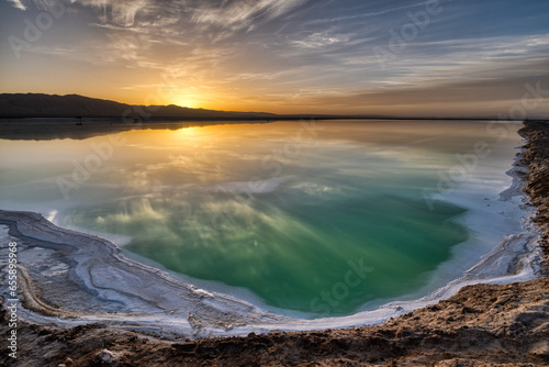 The green salt lake in sunrise, locate at Mangya, Qinghai province, China. photo