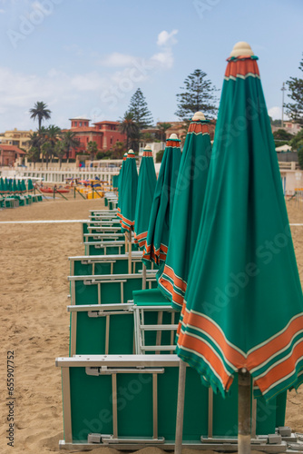 Beach chairs and parasols photo