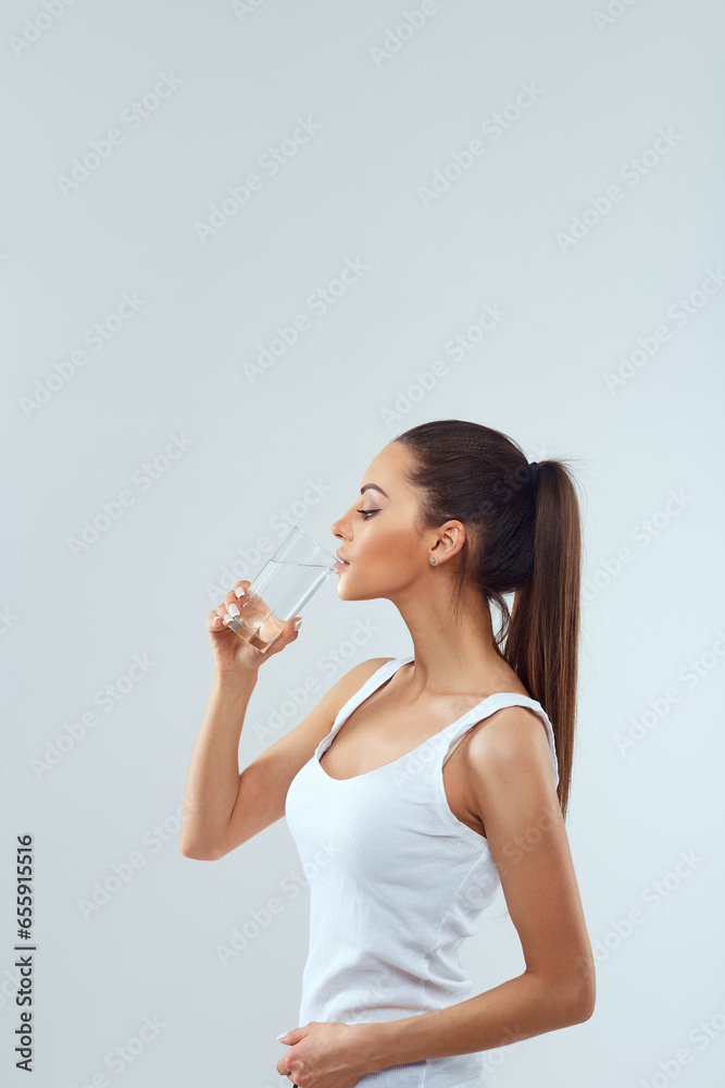 Woman With Glass Of Fresh Water. Healthcare. Drinks. Health, Beauty, Diet Concept. Healthy Lifestyle Eating. Woman With Glass Of Fresh Water. Healthcare. Drinks. Health, Beauty, Diet Concept. Healthy Lifestyle Eating.