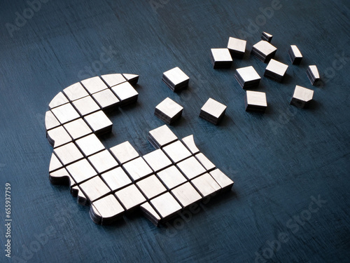 Head made of cubes as symbol of dementia and Alzheimer disease. photo