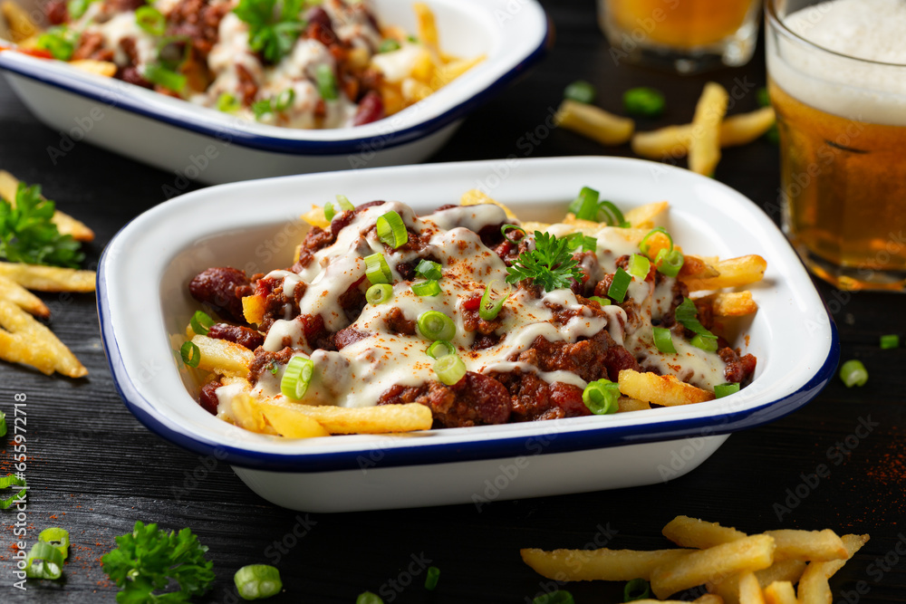 Chili Cheese Potato Fries topped with hot minced beef and cheese sauce Chili Cheese Potato Fries topped with hot minced beef and cheese sauce