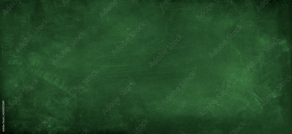 Chalk rubbed out on green chalkboard background