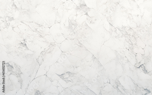 White marble texture with network of thin gray lines forming irregular pattern in landscape orientation. © Botty