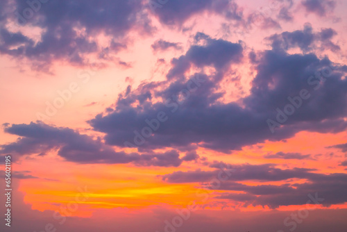 Dark sky with bright clouds at sunset. Evening sky background, dramatic sky landscape © Natalia