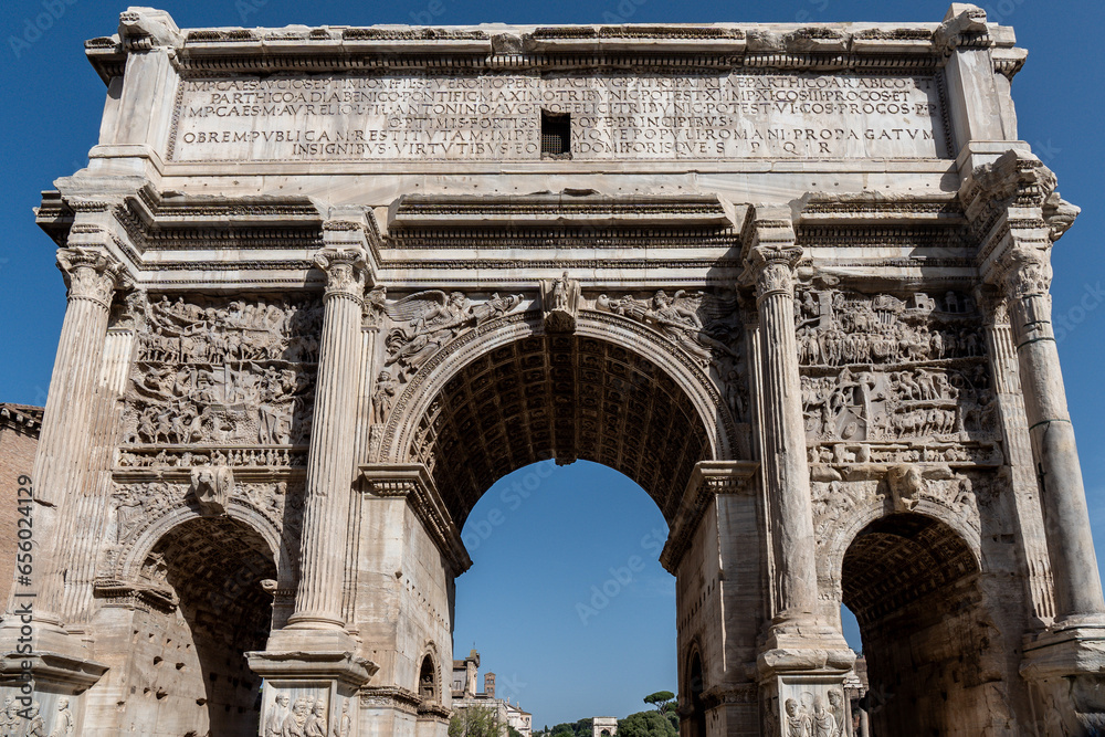 Arch of Titus in the Via Sacra near the Roman Forum in Rome, Italy. Monument made of stone