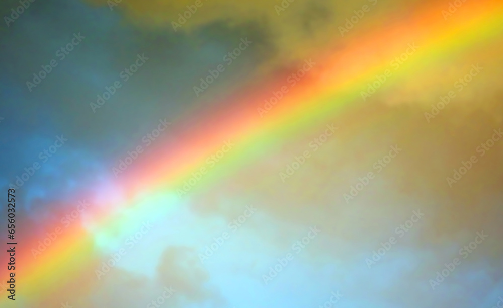 intense vibrant but blurred rainbow colors on the sky after the storm intense vibrant but blurred rainbow colors on the sky after the storm
