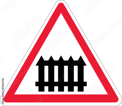 Panneau de danger - Passage à niveau muni de barrières à fonctionnement manuel ou de demi-barrières automatiques lors du passage des trains - A7