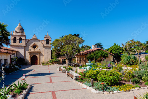 carmel mission basilica with garden and church