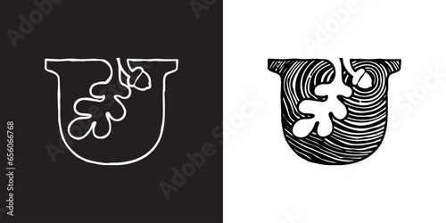 U letter logo with oak leaf and acorn. Tree cross-section. Natural wood texture, ring pattern. Trunk saw cut. Negative space emblem. Vector icon for eco identity, university coat of arms, vintage adv.