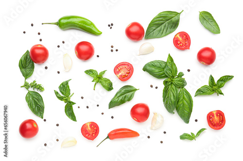 Fresh basil, cherry tomatoes and peppercorn on white background © Pixel-Shot