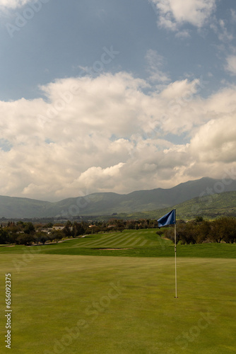 golf course with flag photo