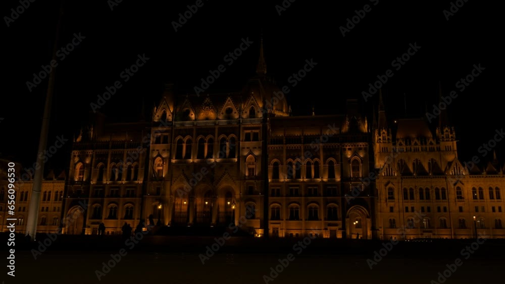 Night lighting of budapest parliament facade. A view of night lighting Budapest parliament during night time. A concept of place of resting and landmark in hungary. Night lighting of budapest parliament facade. A view of night lighting Budapest parliament during night time. A concept of place of resting and landmark in hungary.