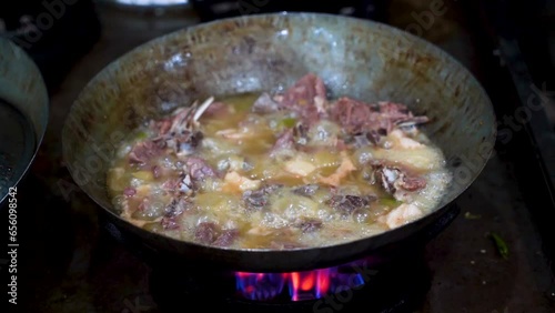 Traditional karahi of mutton at charsi tikka shop, Peshawar, Pakistan