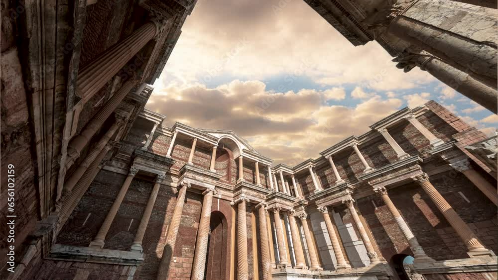 Sardes of Manisa Turkey with time lapse of sunset clouds and gymnasium building Sardes of Manisa Turkey with time lapse of sunset clouds and gymnasium building