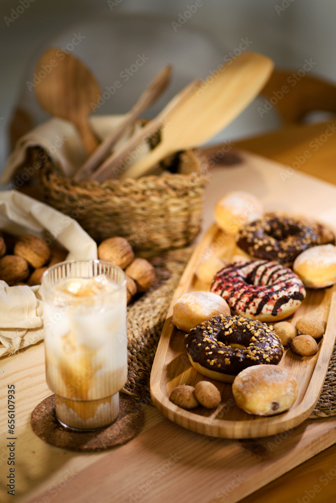 Fototapeta premium Rustic Sweet Treat and Iced Latte Presentation..