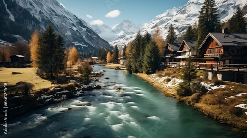 Charming village nestled amidst snow-covered alpine peaks  © Abdul