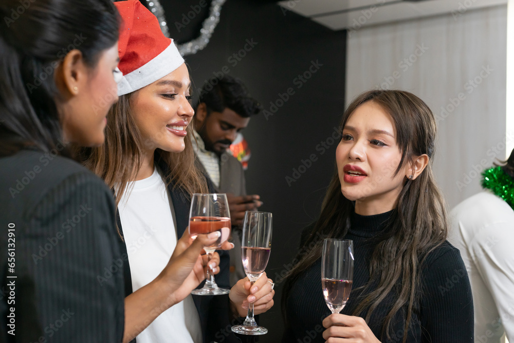 Making a toast, Cheers !! A group of diverse business people and colleagues having fun and meet up together at a business New Year party. A teamwork celebration of a successful business target. Making a toast, Cheers !! A group of diverse business people and colleagues having fun and meet up together at a business New Year party. A teamwork celebration of a successful business target.