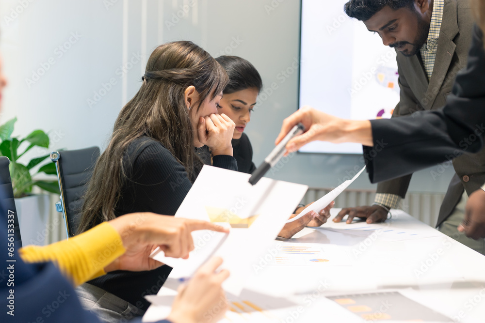 Group of diverse employees business people team during brainstorming. They are discussing new ideas for the new project. Multiracial coworkers colleagues.
