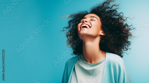 Happy woman dancing isolated on pastel studio background