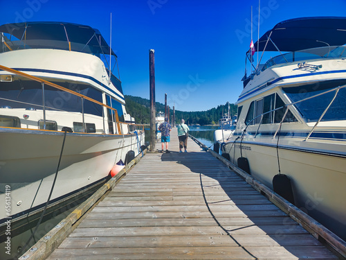 Boat in the harbor and tourism taking photo  photo