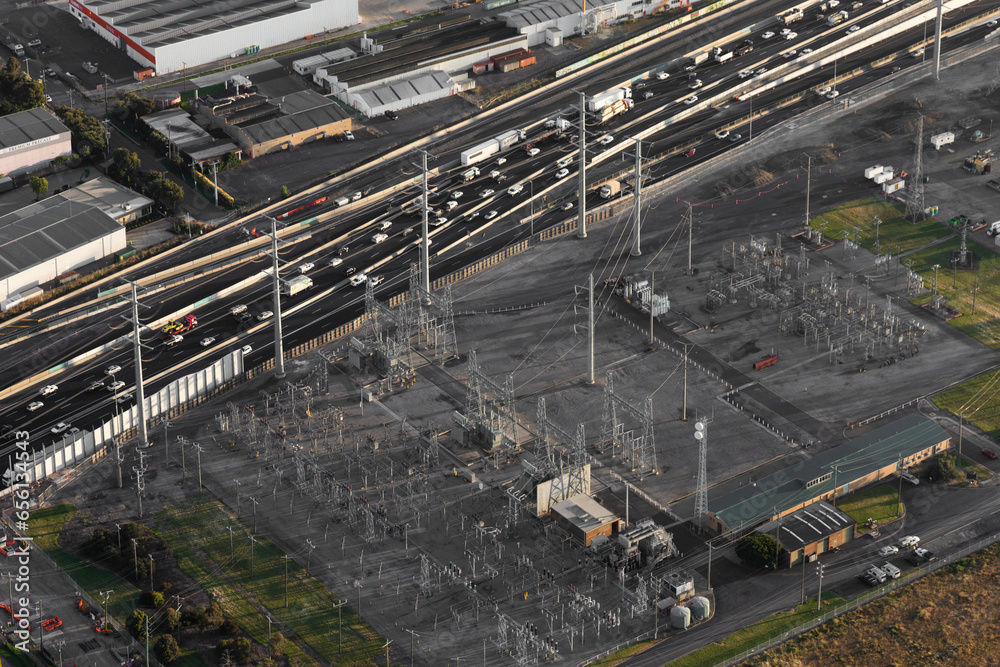 Aerial Perspective of Power Substation Alongside Major Highway