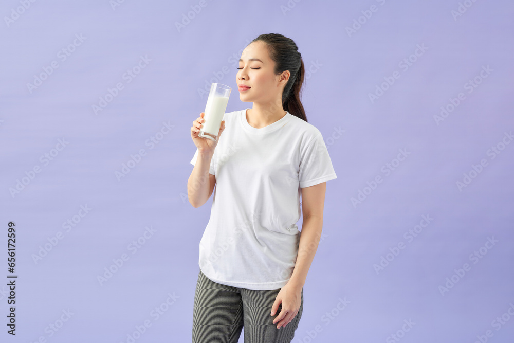 beauty woman Asian cute girl feel happy drinking milk for good health in the morning beauty woman Asian cute girl feel happy drinking milk for good health in the morning