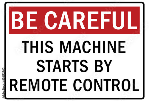 Be careful warning sign and labels this machine start by remote control