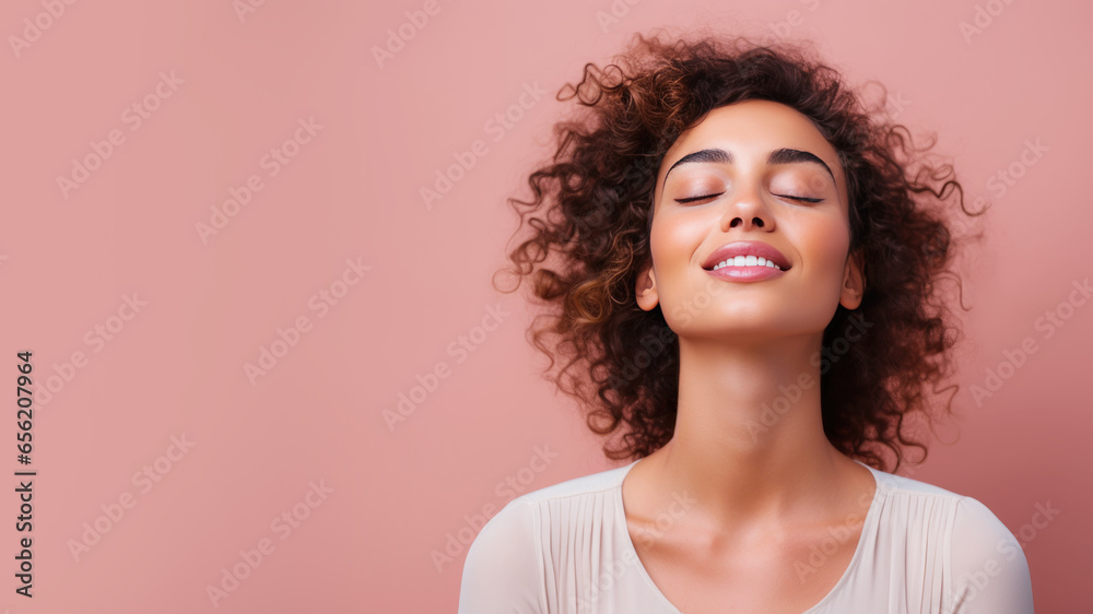 A woman closed eyes breathes relaxedly isolated on pastel background - obrazy, fototapety, plakaty 