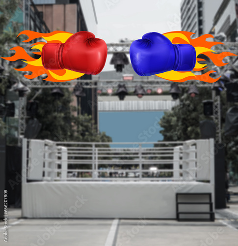 Boxing ring arena with red and blue boxing gloves on fire.