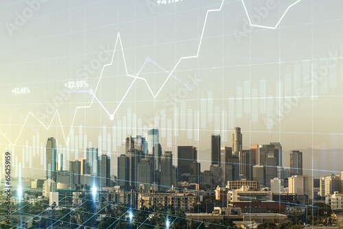 Double exposure of abstract creative financial chart hologram on Los Angeles skyscrapers background  research and strategy concept