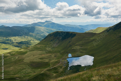 Carpathian Mountains and Lake Dohyaska at the foot of the mountain, Ukraine photo
