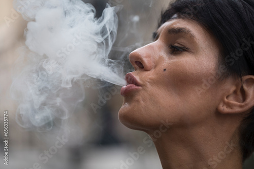 Woman problems smoking a cigarette