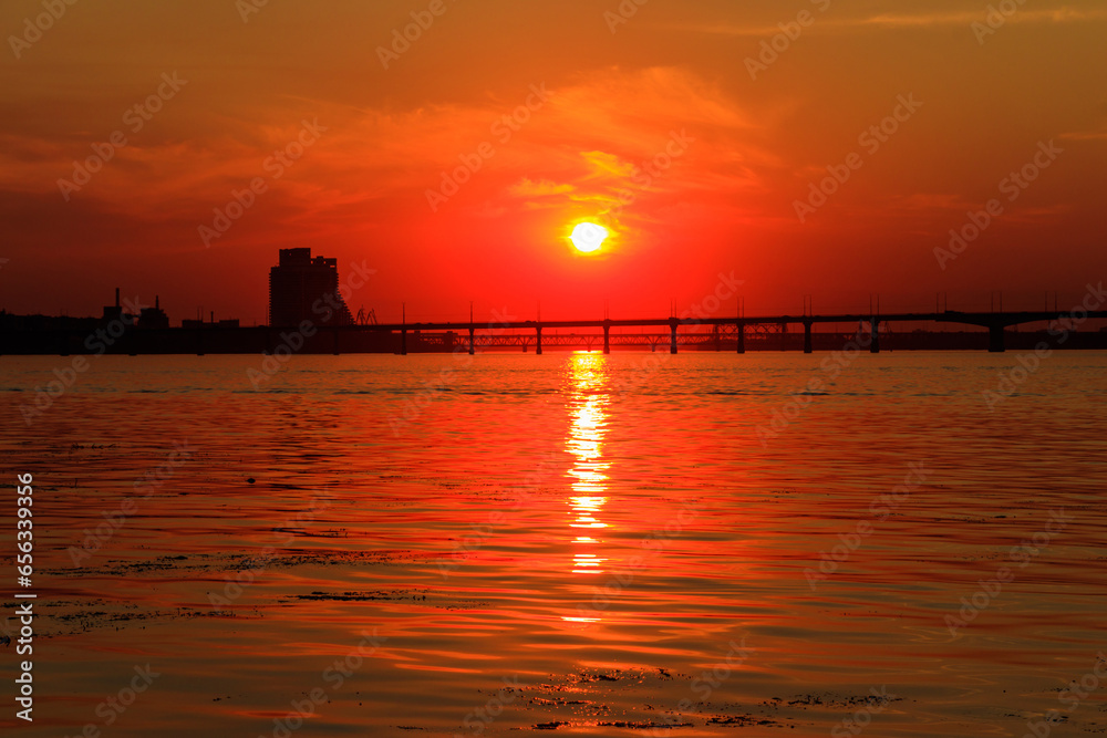 Fototapeta premium Beautiful sunset over the Dnieper river in Dnipro city, Ukraine