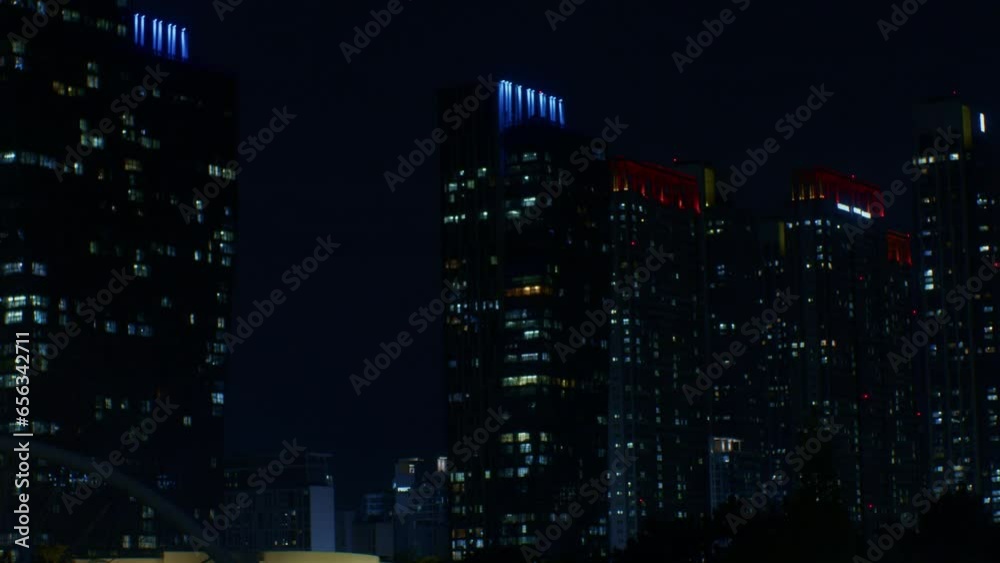 Night city town urban park with architecture and buildings with skyscrapers and lights outdoors on the street Night city town urban park with architecture and buildings with skyscrapers and lights outdoors on the street