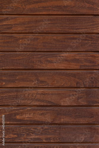 dark brown wooden wall made of planks background