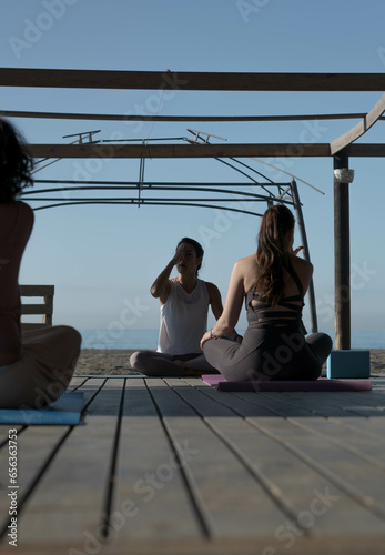 young girl teaching yoga class