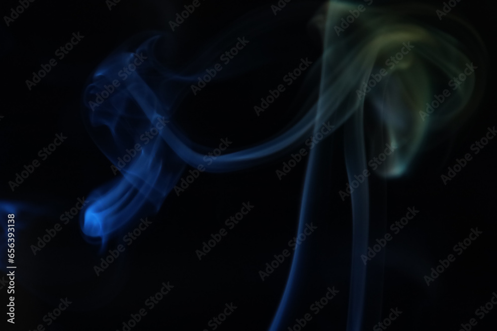 Yellow and blue smoke on a dark background, colourful abstract, one line, minimalistic art	