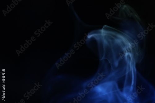 Yellow and blue smoke on a dark background, colourful abstract, one line, minimalistic art 