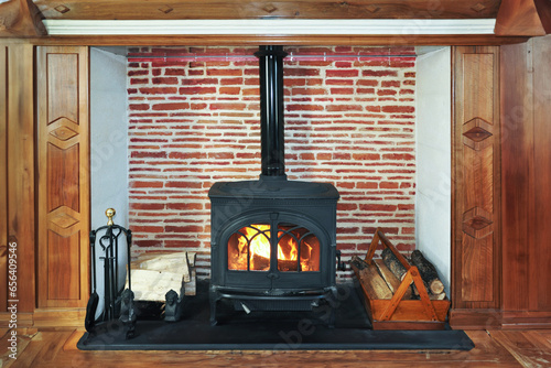 Rustic wood burning stove, wood burner, renewable ernergy heating in winter