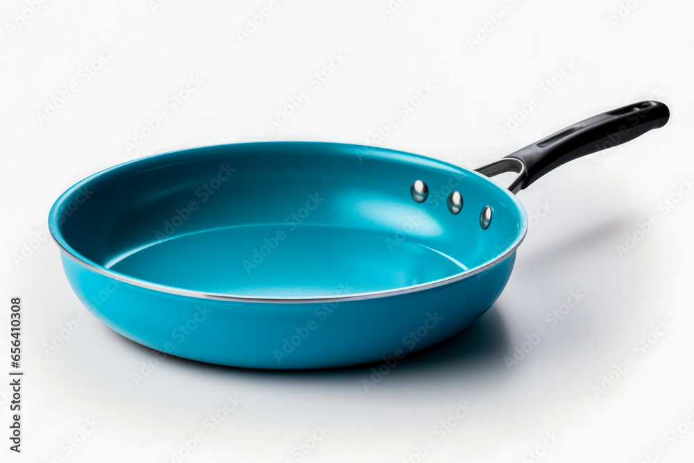 A striking vibrant blue frying pan isolated on a white background A striking vibrant blue frying pan isolated on a white background