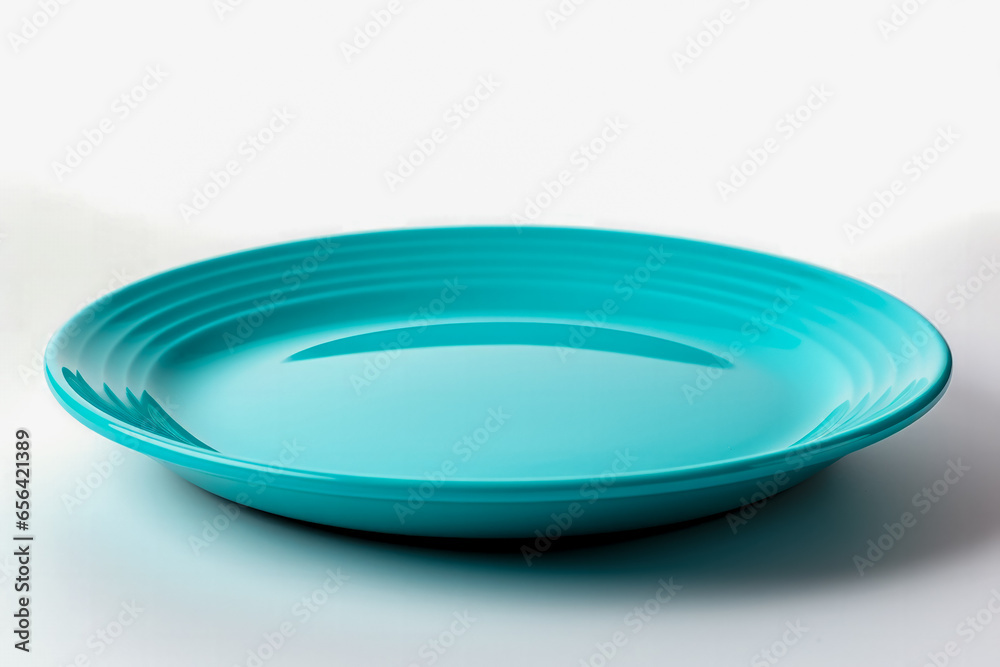 A bright turquoise minimalist saucer with a sleek design isolated on a white background 