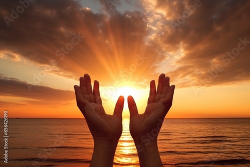 Christian Worship And Praise Concept Hands Rising Against Sunset Background