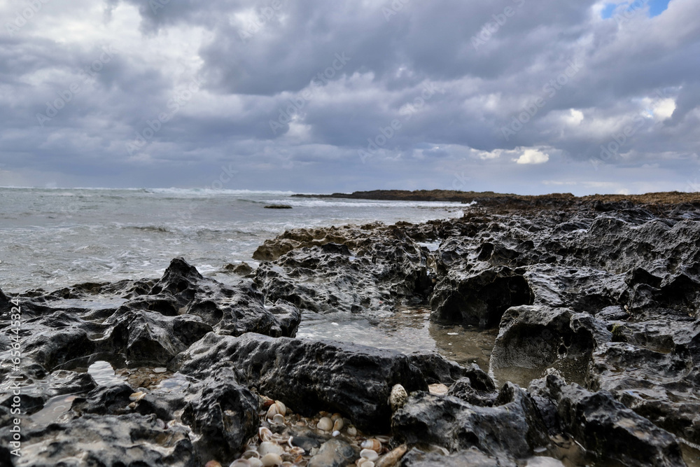 Moon like rocks by the shore 2