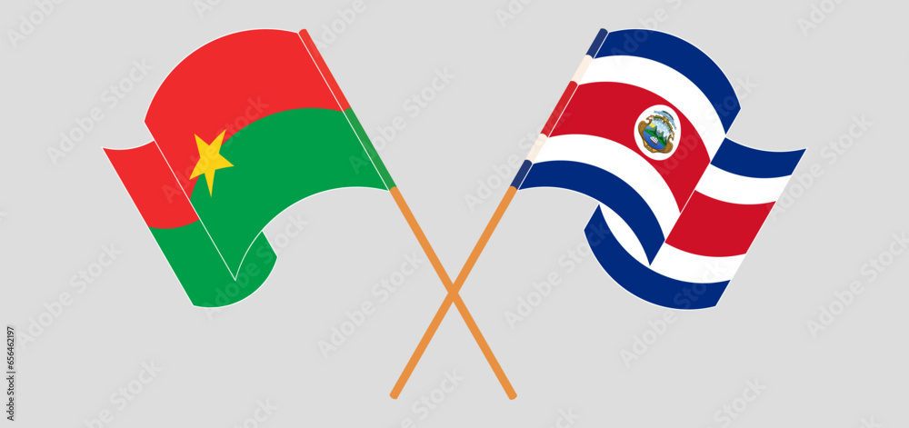 Crossed and waving flags of Burkina Faso and Costa Rica Crossed and waving flags of Burkina Faso and Costa Rica