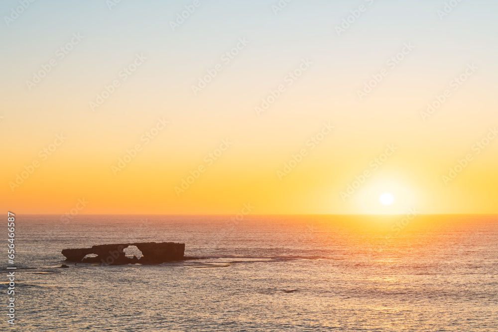 The iconic Doorway Rock in Robe at sunset, South Australia