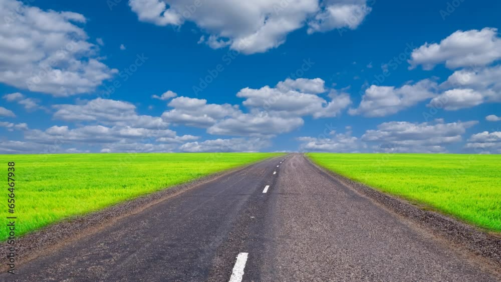 asphalt road in a green field time lapse scene asphalt road in a green field time lapse scene