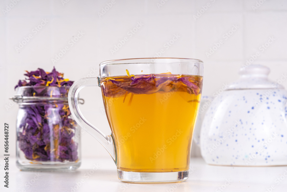 Blue lotos, Nymphaea caerulea hot tea. trendy natural beverage. Anti-stress, soothing and relaxing organic drink, healthy sleep drink Blue lotos, Nymphaea caerulea hot tea. trendy natural beverage. Anti-stress, soothing and relaxing organic drink, healthy sleep drink