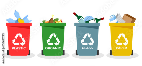 Sorting and recycling garbage by material with different types of colored waste bins with symbols for organic, paper, glass, plastic